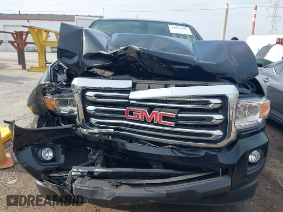 2019 GMC Canyon 4WD SLE z VIN 1GTG6CEN2K1354585, wystawiony jako IAAI lot #42014158 z przebiegiem 34 269 mil mil oraz . Historia ofert i sprzedaży dostępna na DreamBid. Obrazek 12.