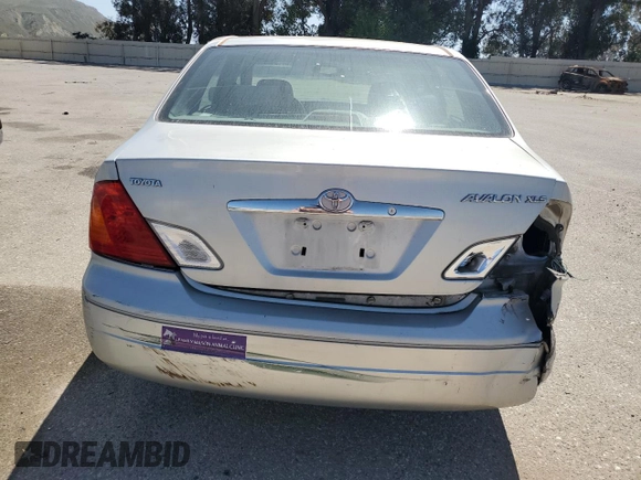 2001 Toyota Avalon XL z VIN 4T1BF28B11U154831, wystawiony jako Copart lot #57131435 z przebiegiem 211 745 mil mil oraz Szkody całkowita. Historia ofert i sprzedaży dostępna na DreamBid. Obrazek 6.
