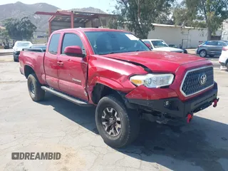 2019 Toyota Tacoma SR z VIN 5TFRX5GN5KX132845, wystawiony jako IAAI lot #42420201 z przebiegiem 81 118 mil mil oraz . Historia ofert i sprzedaży dostępna na DreamBid. Obrazek 1.