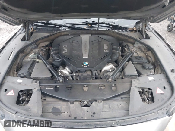 2012 BMW 7 Series 750i with VIN WBAKA8C50CDX01319, listed as a IAAI auction lot 42133359 with 168,986 mi miles and . Bid and sale history available at DreamBid. Image 10.