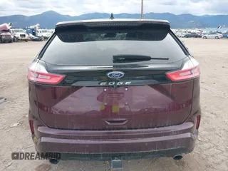 2021 Ford Edge SEL z VIN 2FMPK4J9XMBA59022, wystawiony jako IAAI lot #40596255 z przebiegiem 41 770 mil mil oraz . Historia ofert i sprzedaży dostępna na DreamBid. Obrazek 16.
