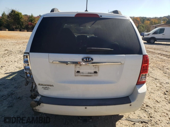 2011 Kia Sedona LX with VIN KNDMG4C76B6398313, listed as a Copart auction lot 77766494 with 244,988 mi miles and Salvage Title. Bid and sale history available at carsss.com. Image 6.