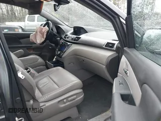 2014 Honda Odyssey EX-L with VIN 5FNRL5H63EB033684, listed as a IAAI auction lot 42025249 with 128,017 mi miles and . Bid and sale history available at carsss.com. Image 5.