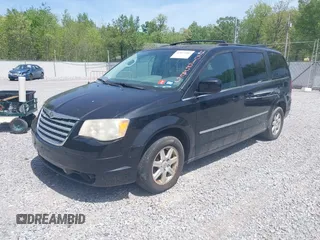2010 Chrysler Town & Country Touring with VIN 2A4RR5D11AR102714, listed as a IAAI auction lot 42015585 with 176,216 mi miles. Bid and sale history available at carsss.com. Image 2.