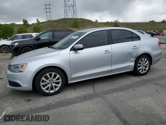 2014 Volkswagen Jetta SE with VIN 3VWD17AJ0EM314456, listed as a Copart auction lot 57380645 with 148,801 mi miles and Salvage title. Bid and sale history available at DreamBid. Image 1.