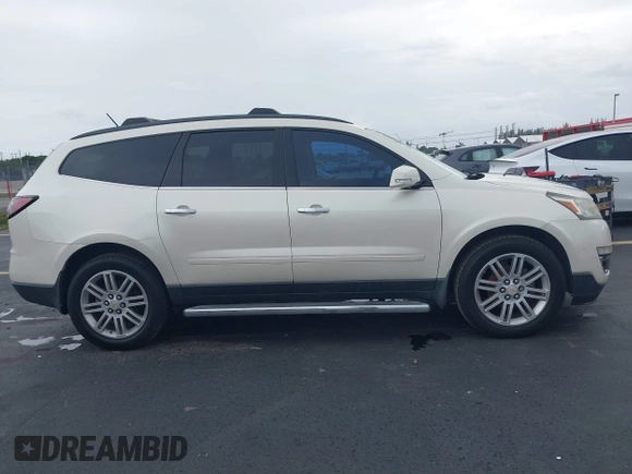 2015 Chevrolet Traverse LT z VIN 1GNKRGKD4FJ137234, wystawiony jako IAAI lot #42655806 z przebiegiem 60 871 mil mil oraz . Historia ofert i sprzedaży dostępna na DreamBid. Obrazek 13.