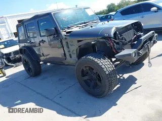 2014 Jeep Wrangler Unlimited Sport with VIN 1C4BJWDG4EL295044, listed as a IAAI auction lot 41997837 with 143,447 mi miles. Bid and sale history available at carsss.com. Image 1.