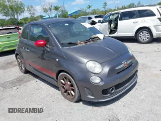 2015 FIAT 500 Abarth with VIN 3C3CFFFH2FT507879, listed as a IAAI auction lot 42135649 with 163,663 mi miles. Bid and sale history available at carsss.com. Image 1.