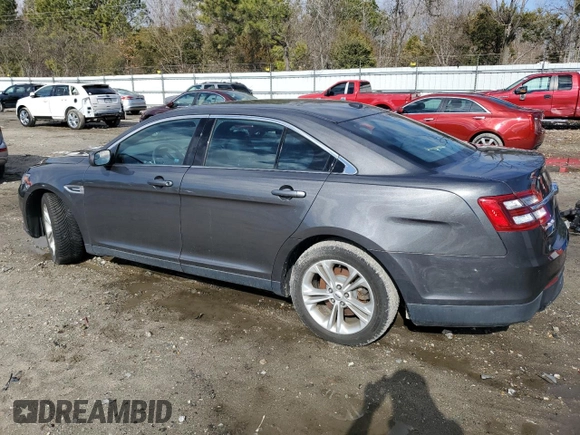 2015 Ford Taurus SEL with VIN 1FAHP2H86FG115860, listed as a Copart auction lot 43218065 with 99,548 mi miles and Salvage Title. Bid and sale history available at DreamBid. Image 2.