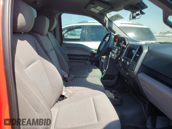 2019 Ford F-150 XL with VIN 1FTMF1E57KKC36789, listed as a Copart auction lot 69457224 with 26,509 mi miles and Salvage title. Bid and sale history available at DreamBid. Image 10.
