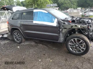 2017 Jeep Grand Cherokee Overland with VIN 1C4RJFCG4HC730861, listed as a Copart auction lot 62918825 with 77,228 mi miles and Salvage title. Bid and sale history available at DreamBid. Image 4.