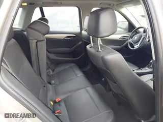 2015 BMW X1 xDrive28i with VIN WBAVL1C55FVY41749, listed as a IAAI auction lot 40977221 with 120,924 mi miles. Bid and sale history available at carsss.com. Image 8.