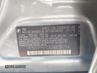 2011 BMW 3 Series 328i with VIN WBAPH7C52BE131134, listed as a IAAI auction lot 42114364 with 145,956 mi miles and . Bid and sale history available at carsss.com. Image 9.
