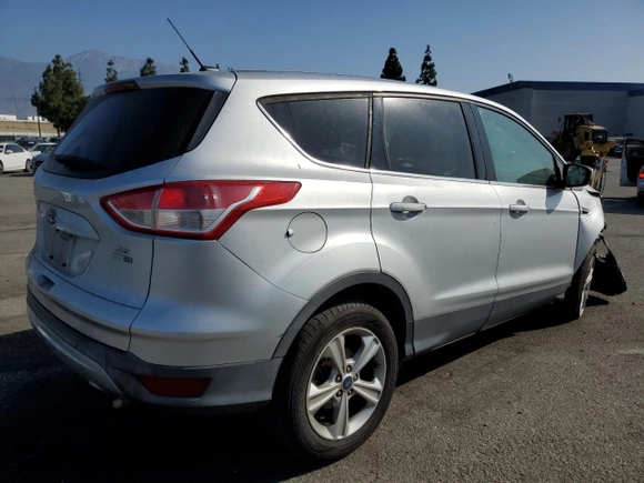 2013 Ford Escape SE with VIN 1FMCU9G91DUA14350, listed as a Copart auction lot 63651315 with 165,414 mi miles and Salvage title. Bid and sale history available at DreamBid. Image 3.