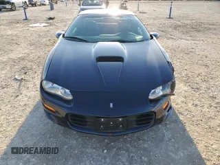 2000 Chevrolet Camaro Z28 z VIN 2G1FP22G3Y2123001, wystawiony jako Copart lot #85730994 z przebiegiem 32 579 mil mil oraz Szkoda całkowita • Salvage title. Historia ofert i sprzedaży dostępna na DreamBid. Obrazek 5.