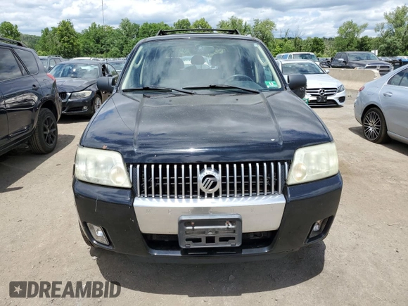 2005 Mercury Mariner Luxury z VIN 4M2CU57185DJ16120, wystawiony jako Copart lot #61803024 z przebiegiem 176 498 mil mil oraz Szkody całkowita. Historia ofert i sprzedaży dostępna na DreamBid. Obrazek 5.