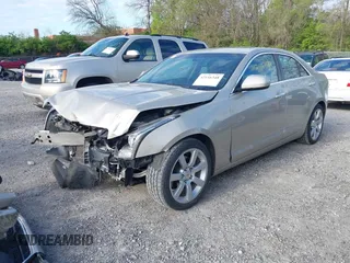 2014 Cadillac ATS Standard RWD z VIN 1G6AA5RA0E0103116, wystawiony jako IAAI lot #42116348 z przebiegiem 133 956 mil mil oraz . Historia ofert i sprzedaży dostępna na DreamBid. Obrazek 18.