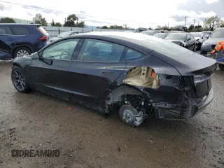 2022 Tesla Model 3 Long Range with VIN 5YJ3E1EB2NF313672, listed as a Copart auction lot 48896025 with 19,936 mi miles and Salvage Title. Bid and sale history available at DreamBid. Image 2.