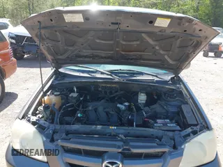 2005 Mazda Tribute S with VIN 4F2YZ04125KM04568, listed as a IAAI auction lot 41973671 with 244,117 mi miles and . Bid and sale history available at carsss.com. Image 10.