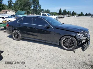 2014 Mercedes-Benz E 350 Luxury with VIN WDDHF8JBXEA981753, listed as a Copart auction lot 60556625 with 132,742 mi miles and Salvage title. Bid and sale history available at DreamBid. Image 4.