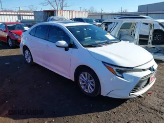 2023 Toyota Corolla Hybrid LE with VIN JTDBCMFE1PJ011085, listed as a IAAI auction lot 41340297 with 34,437 mi miles. Bid and sale history available at carsss.com. Image 1.
