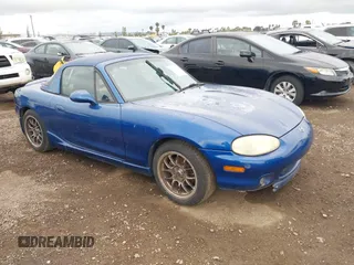 1999 Mazda MX-5 Miata z VIN JM1NB3539X0130910, wystawiony jako IAAI lot #42175118 z przebiegiem 91 570 mil mil oraz . Historia ofert i sprzedaży dostępna na DreamBid. Obrazek 1.
