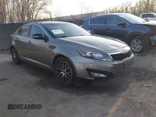 2013 Kia Optima LX with VIN 5XXGM4A77DG166140, listed as a IAAI auction lot 41881144 with 185,391 mi miles. Bid and sale history available at carsss.com. Image 1.