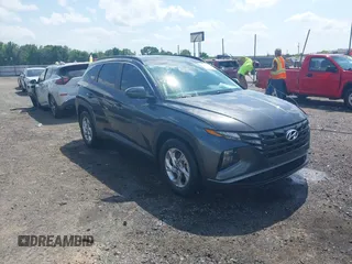 2022 Hyundai Tucson SEL z VIN 5NMJB3AE7NH064439, wystawiony jako IAAI lot #42123649 z przebiegiem 98 181 mil mil oraz . Historia ofert i sprzedaży dostępna na DreamBid. Obrazek 1.