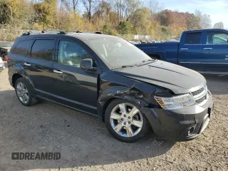 2013 Dodge Journey R/T with VIN 3C4PDDFG6DT736495, listed as a Copart auction lot 76912344 with 186,004 mi miles and Clean title. Bid and sale history available at DreamBid. Image 4.