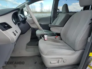 2012 Toyota Sienna LE with VIN 5TDJK3DC7CS047290, listed as a Copart auction lot 50822655 with 173,675 mi miles and Salvage Title. Bid and sale history available at carsss.com. Image 7.
