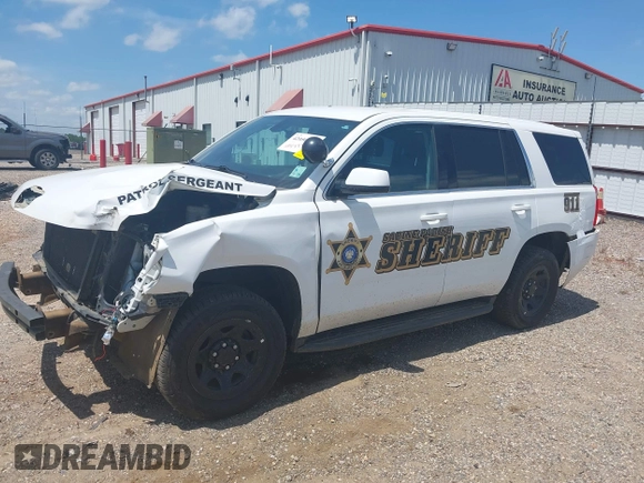 2020 Chevrolet Tahoe Commercial with VIN 1GNLCDECXLR154849, listed as a IAAI auction lot 42050778 with 124,771 mi miles and . Bid and sale history available at DreamBid. Image 23.