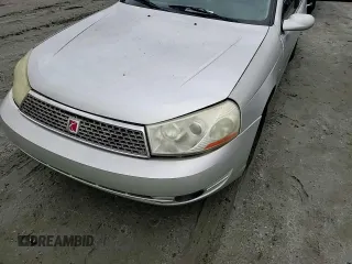 2003 Saturn LS z VIN 1G8JU54F13Y556015, wystawiony jako Copart lot #67447604 z przebiegiem Nie podano mil oraz Szkody całkowita. Historia ofert i sprzedaży dostępna na DreamBid. Obrazek 10.