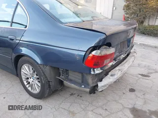 2002 BMW 5 Series 530iA with VIN WBADT63452CH97647, listed as a IAAI auction lot 41258552 with 94,762 mi miles. Bid and sale history available at carsss.com. Image 6.