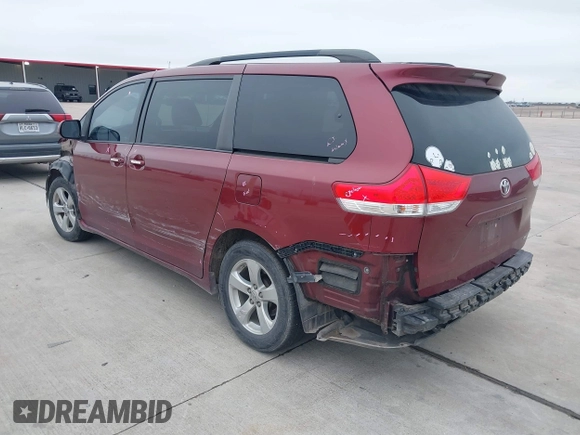 2014 Toyota Sienna LE AAS with VIN 5TDKK3DC6ES487962, listed as a IAAI auction lot 41568458 with 164,043 mi miles. Bid and sale history available at carsss.com. Image 3.