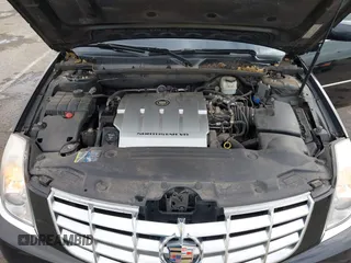 2006 Cadillac DTS w/1SC with VIN 1G6KD57Y96U251691, listed as a IAAI auction lot 41086147 with 128,959 mi miles. Bid and sale history available at carsss.com. Image 10.