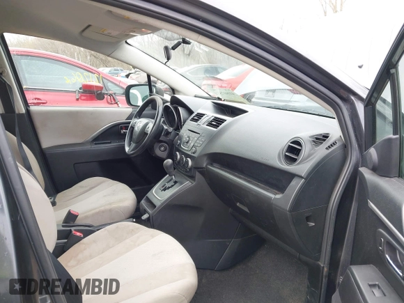 2013 Mazda 5 Sport with VIN JM1CW2BL5D0159603, listed as a IAAI auction lot 41807574 with 121,206 mi miles and . Bid and sale history available at carsss.com. Image 5.