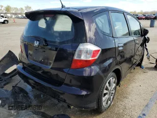 2013 Honda Fit Sport z VIN JHMGE8H68DC053863, wystawiony jako Copart lot #52140945 z przebiegiem Nie podano mil oraz Szkoda całkowita • Salvage title. Historia ofert i sprzedaży dostępna na DreamBid. Obrazek 3.