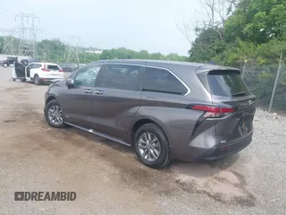 2021 Toyota Sienna XLE with VIN 5TDYSKFC9MS014413, listed as a IAAI auction lot 42449852 with 111,712 mi miles and . Bid and sale history available at DreamBid. Image 3.