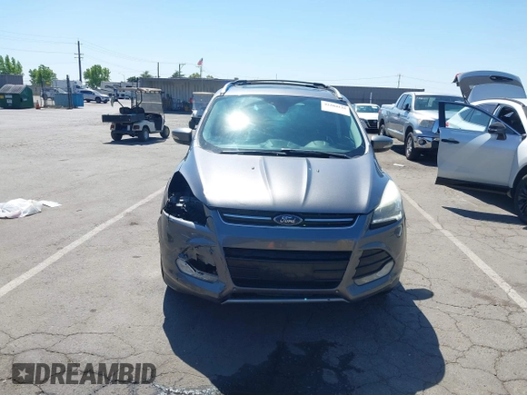 2014 Ford Escape Titanium с VIN 1FMCU0J95EUC22897, выставлен на аукционе IAAI как лот 42204135 с пробегом 144 534 миль миль и . История ставок и продаж доступна на DreamBid. Изображение 13.