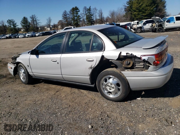 2001 Saturn SL z VIN 1G8ZK54701Z301199, wystawiony jako Copart lot #48488335 z przebiegiem 96 151 mil mil oraz Szkoda całkowita • Salvage title. Historia ofert i sprzedaży dostępna na DreamBid. Obrazek 2.