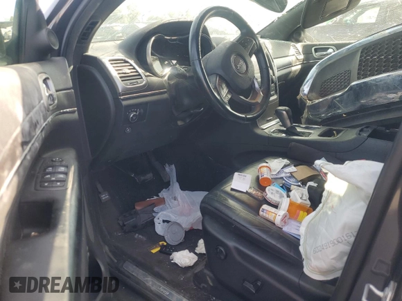 2018 Jeep Grand Cherokee Limited with VIN 1C4RJEBG5JC301438, listed as a Copart auction lot 61646835 with 66,568 mi miles and Salvage title. Bid and sale history available at DreamBid. Image 8.