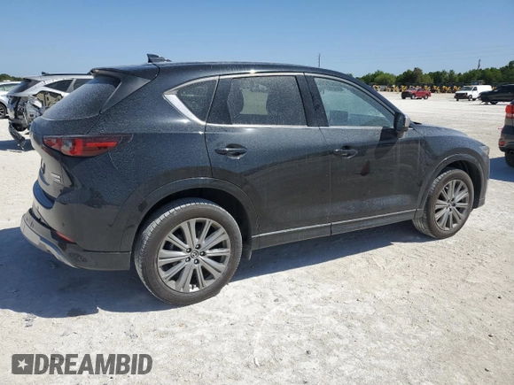 2024 Mazda CX-5 2.5 Turbo Signature with VIN JM3KFBXY2R0354346, listed as a Copart auction lot 49260525 with 9,571 mi miles and Salvage Title. Bid and sale history available at carsss.com. Image 3.