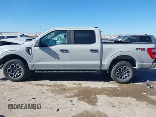 2023 Ford F-150 XL with VIN 1FTFW1E57PKE62881, listed as a IAAI auction lot 41481403 with 20,603 mi miles. Bid and sale history available at carsss.com. Image 14.