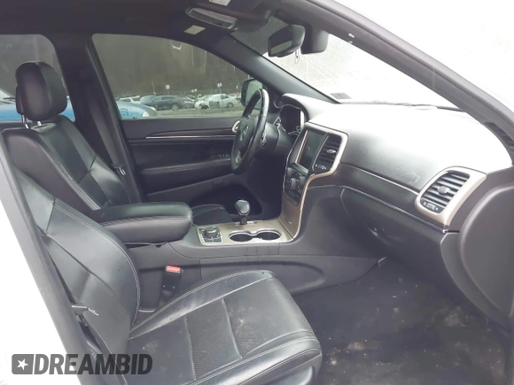 2014 Jeep Grand Cherokee Limited z VIN 1C4RJFBG8EC466380, wystawiony jako IAAI lot #38710809 z przebiegiem 169 540 mil mil oraz . Historia ofert i sprzedaży dostępna na DreamBid. Obrazek 5.