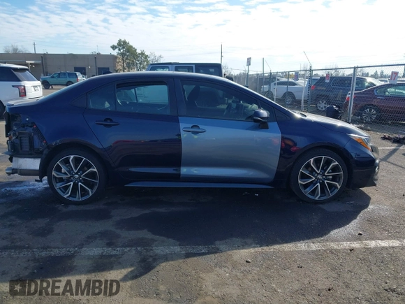 2021 Toyota Corolla SE with VIN 5YFP4MCE5MP082661, listed as a IAAI auction lot 41573579 with 58,418 mi miles and . Bid and sale history available at DreamBid. Image 14.