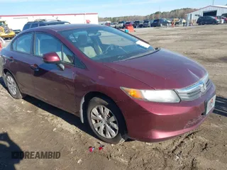 2012 Honda Civic LX z VIN 2HGFB2F50CH607519, wystawiony jako IAAI lot #41871039 z przebiegiem 150 327 mil mil oraz . Historia ofert i sprzedaży dostępna na DreamBid. Obrazek 1.