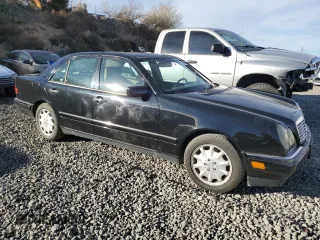 1998 Mercedes-Benz E 320 with VIN WDBJF25F4WA504385, listed as a Copart auction lot 79555844 with 392,558 mi miles and Clean Title. Bid and sale history available at DreamBid. Image 4.