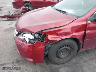 2015 Toyota Camry XLE with VIN 4T1BF1FK2FU982570, listed as a IAAI auction lot 41629755 with 245,224 mi miles. Bid and sale history available at carsss.com. Image 6.