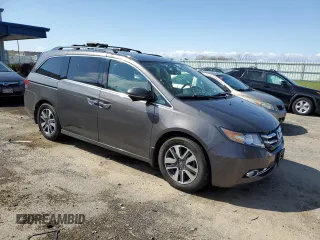 2017 Honda Odyssey Touring with VIN 5FNRL5H91HB013660, listed as a Copart auction lot 54246815 with 79,501 mi miles and Clean title. Bid and sale history available at DreamBid. Image 4.