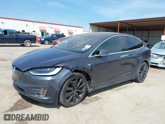 2017 Tesla Model X 90D with VIN 5YJXCBE22HF079194, listed as a IAAI auction lot 41895591 with 102,437 mi miles and . Bid and sale history available at DreamBid. Image 17.